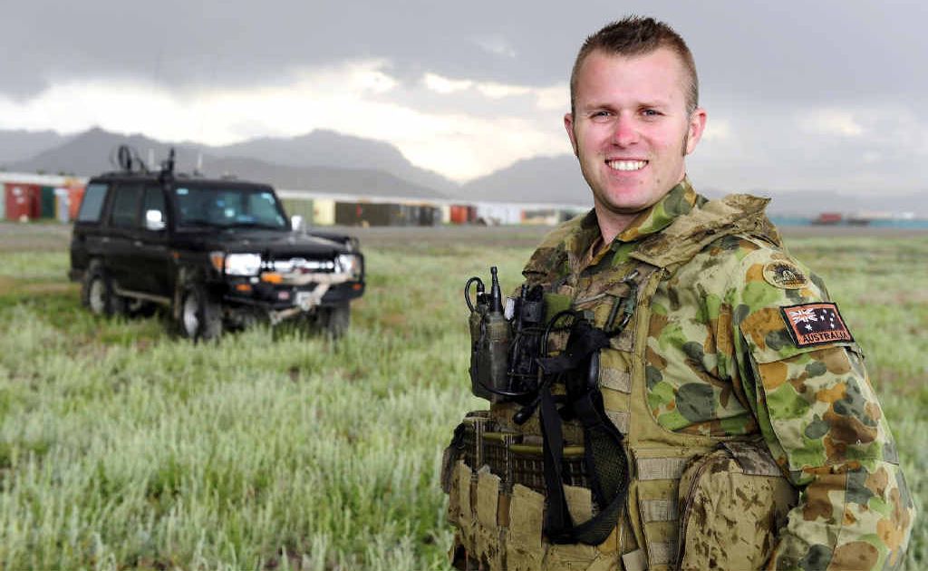 Corporal Tim Kusters of Joint Task Force 633 - Afghanistan with his Land Cruiser at Kabul International Airport. Corporal Tim Kusters of Joint Task Force 633 - Afghanistan with his Land Cruiser at Kabul International Airport.
